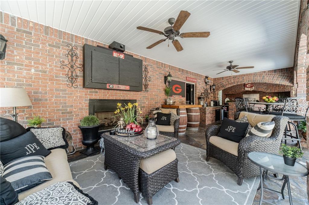 1600 Beagle Run Monroe, GA 30656 - Photo 74 of 103 a living room with furniture and a view of kitchen