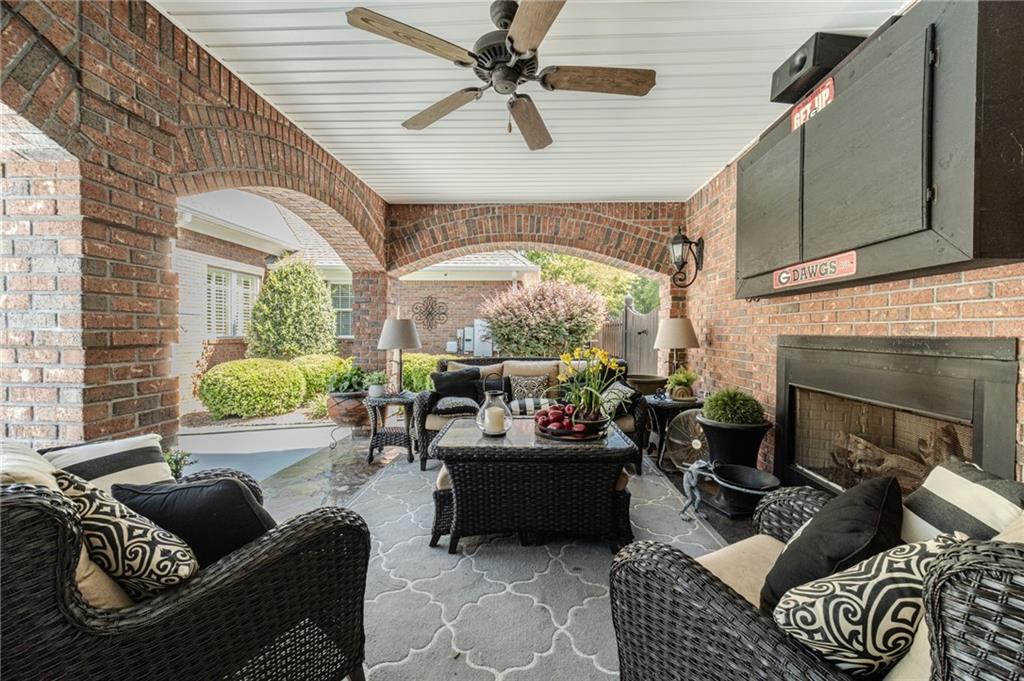 1600 Beagle Run Monroe, GA 30656 - Photo 75 of 103 a living room with furniture fireplace and a large window