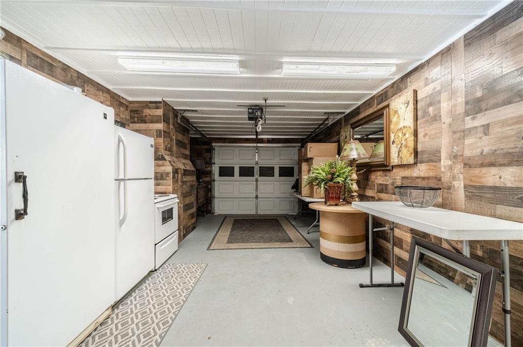 1600 Beagle Run Monroe, GA 30656 - Photo 81 of 103 a kitchen with a refrigerator and a sink