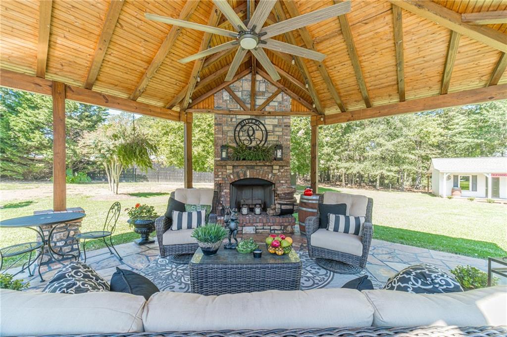 1600 Beagle Run Monroe, GA 30656 - Photo 86 of 103 a front view of a house with garden and patio