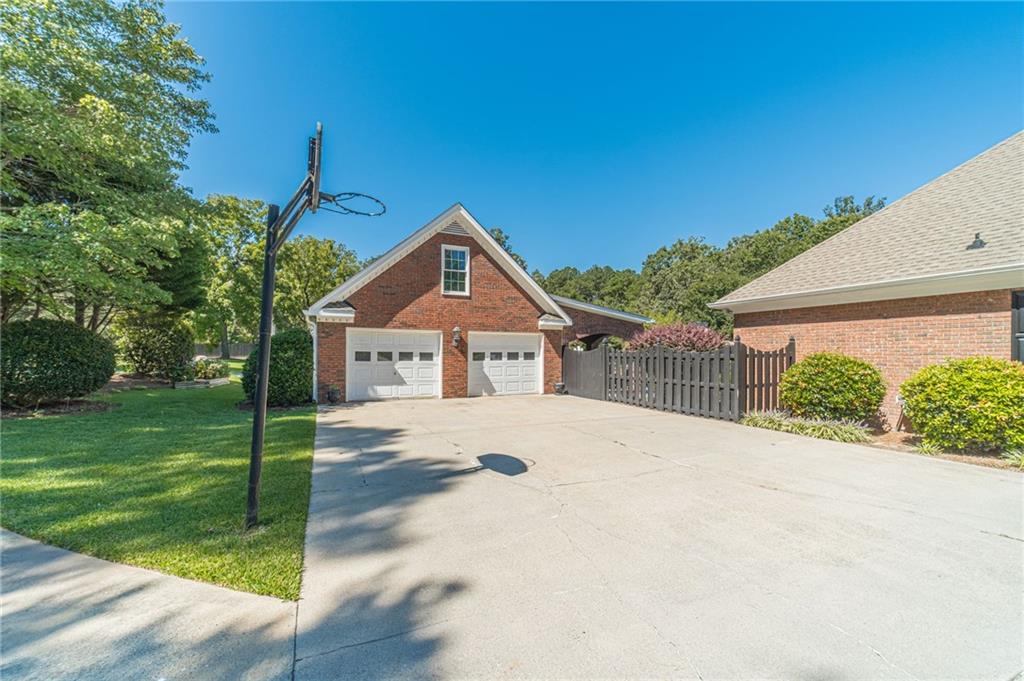 1600 Beagle Run Monroe, GA 30656 - Photo 9 of 103 a front view of a house with a yard