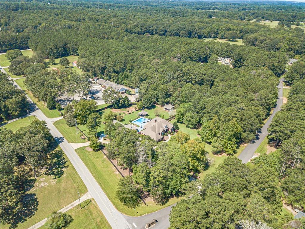 1600 Beagle Run Monroe, GA 30656 - Photo 96 of 103 a view of a lake with a house