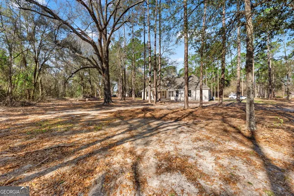 a view of road with trees