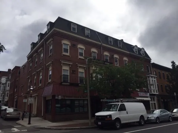 a car parked in front of a building