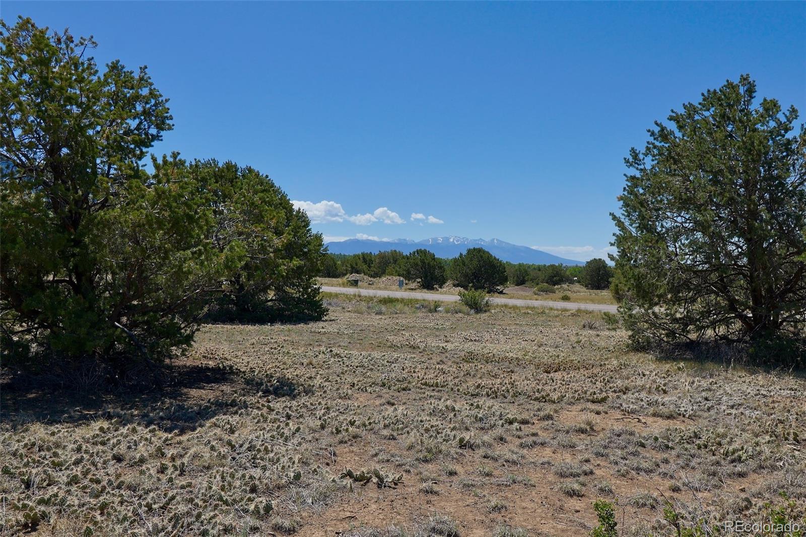 1515 Wagon Wheel Road Crestone, CO 81131 - Photo 3 of 15 a view of an outdoor space and a yard