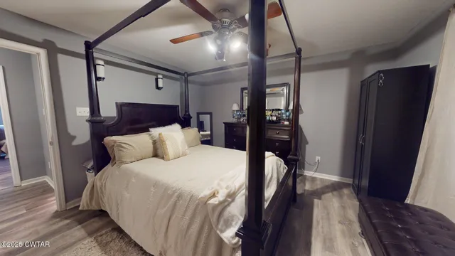 a bedroom with a bed and a walk in closet