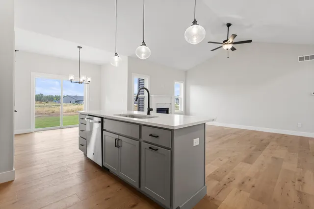 a bathroom with a double vanity sink and mirror