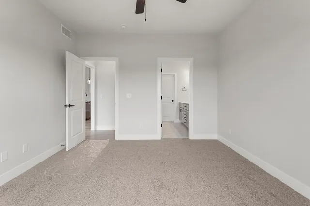 a bathroom with a sink double vanity and a mirror