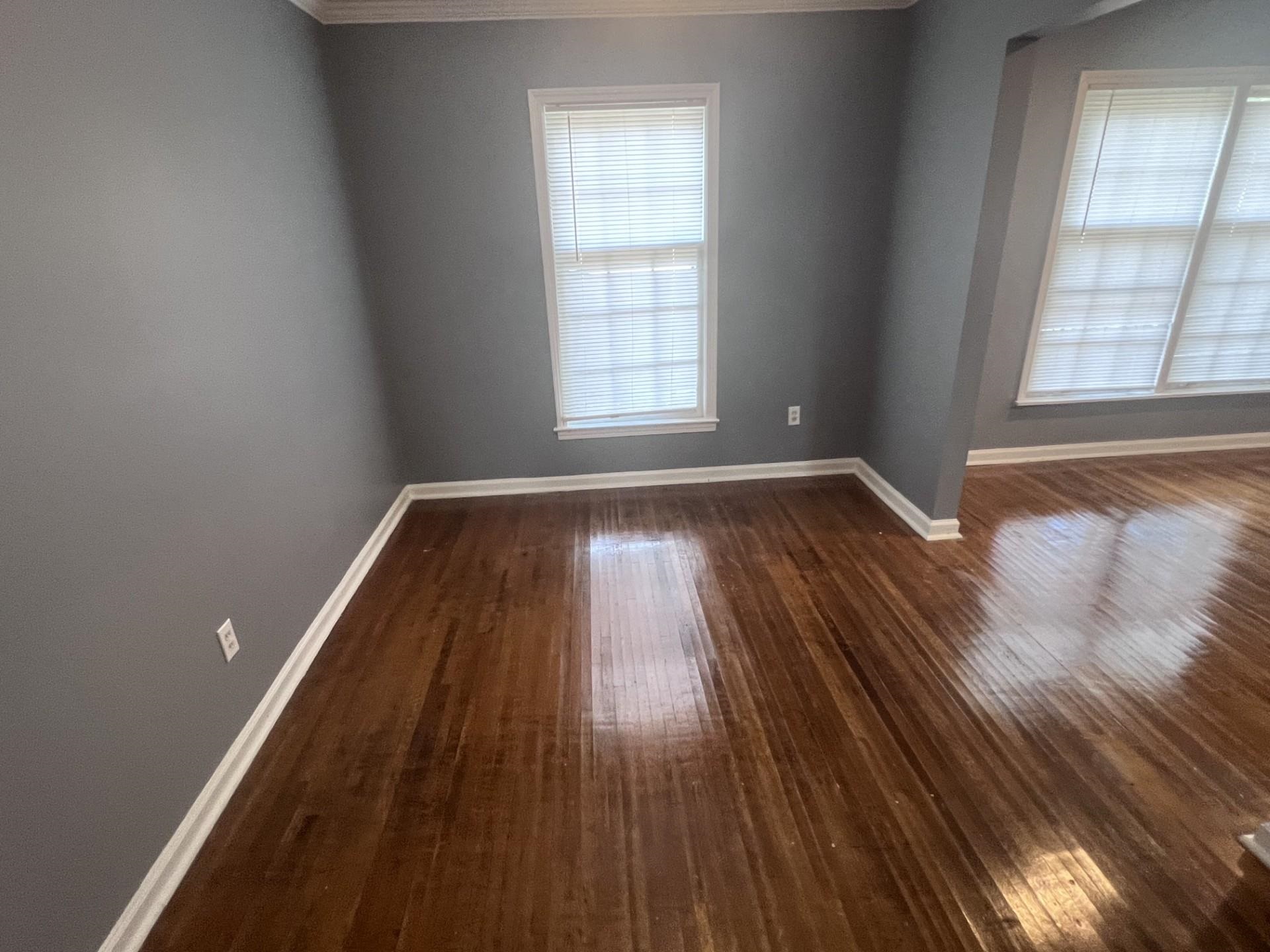 3553 Rhodes Avenue Memphis, TN 38111 - Photo 7 of 14 a view of a room with wooden floors and window