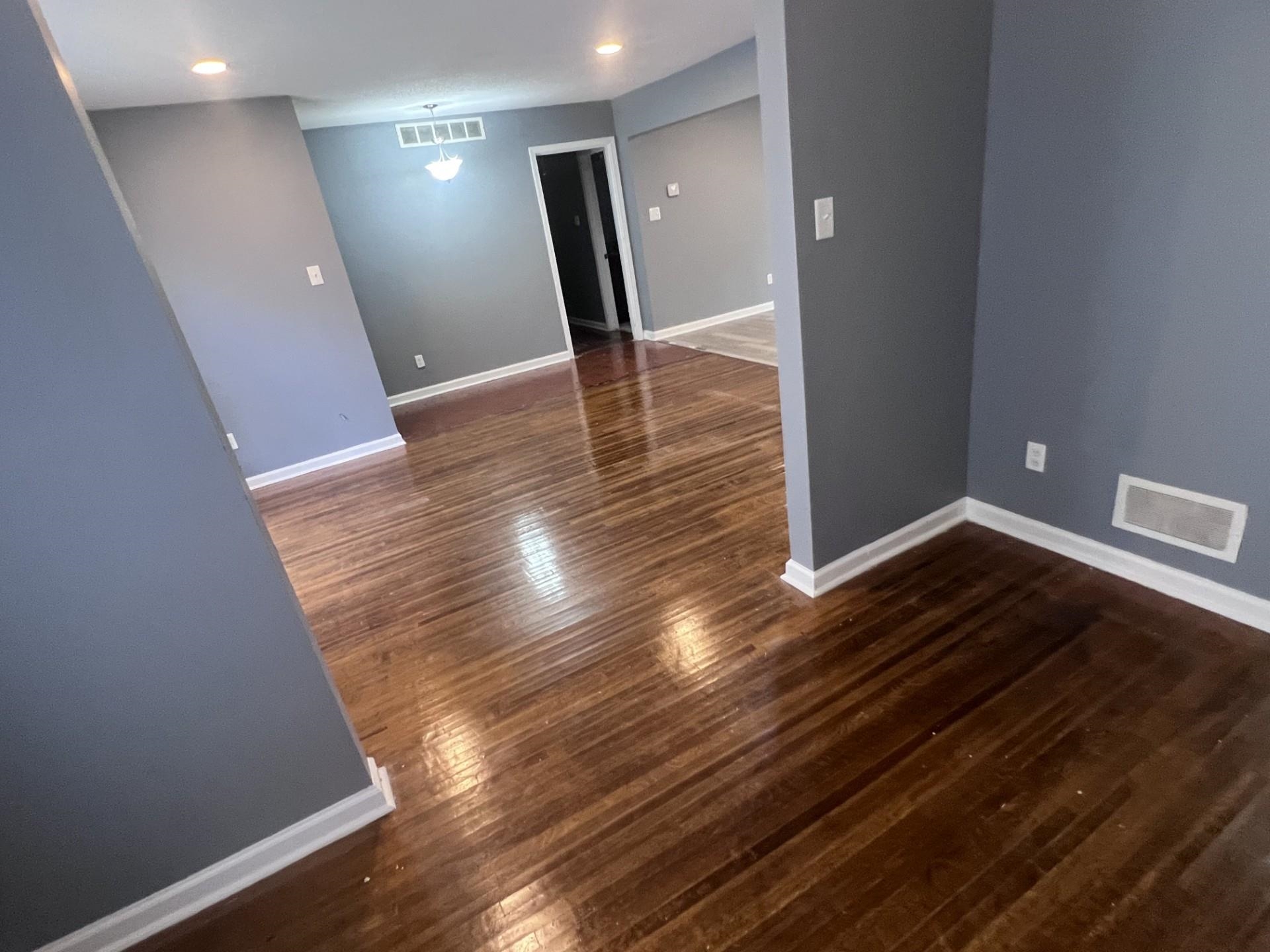 3553 Rhodes Avenue Memphis, TN 38111 - Photo 8 of 14 a view of a hallway with wooden floor