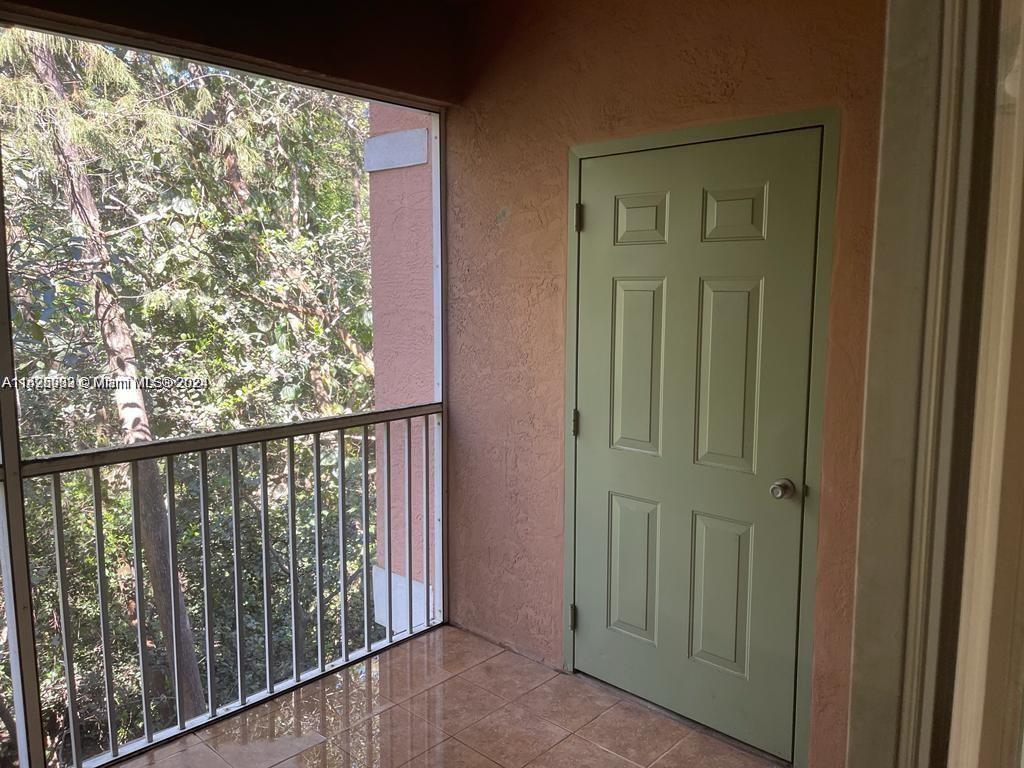 6912 West Sample Road, Unit 6912 Pompano Beach, FL 33063 - Photo 16 of 27 a view of a balcony