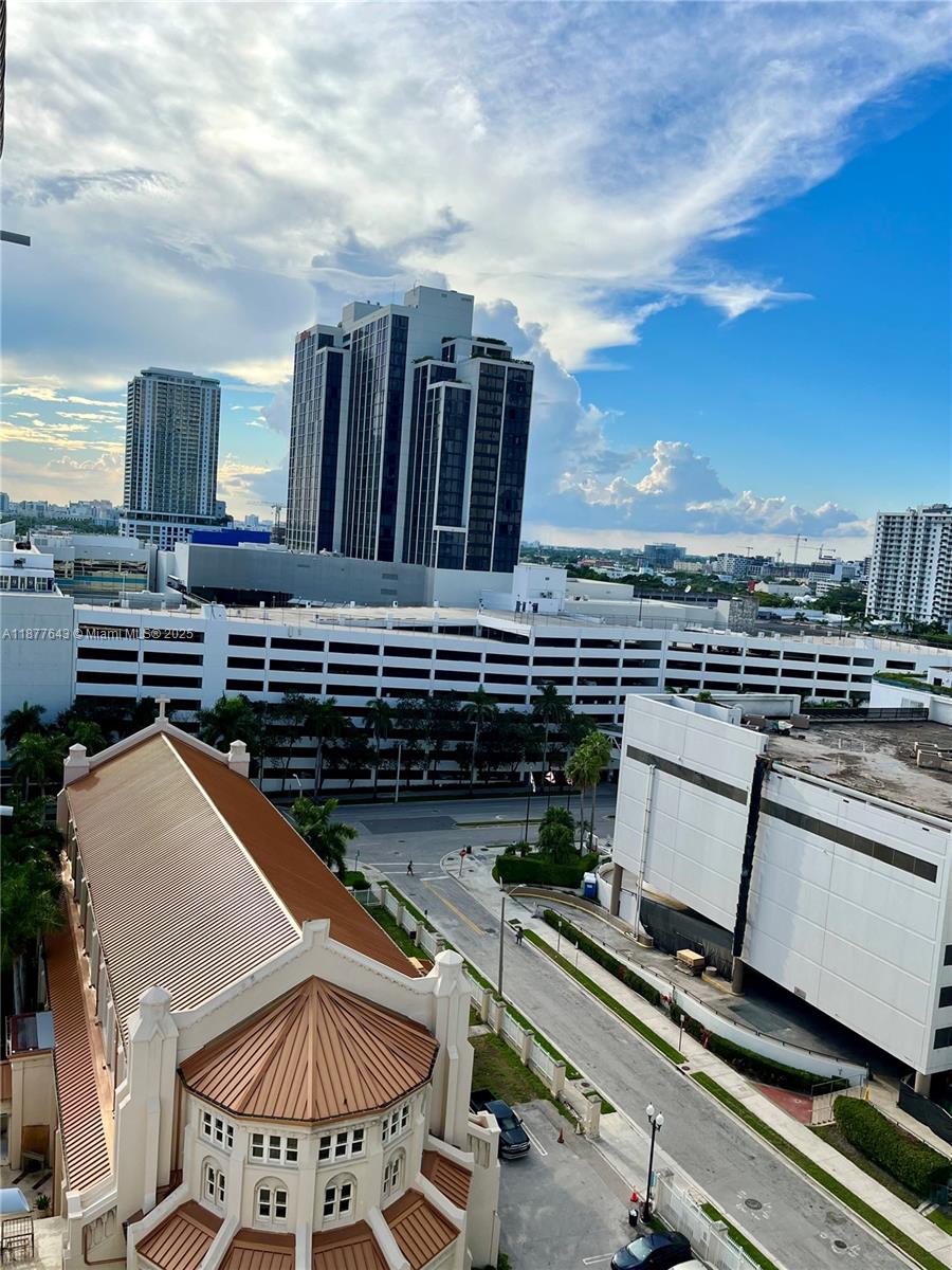 555 Northeast 15th Street, Unit 15G Miami, FL 33132 - Photo 18 of 61 a view of a chairs and table on the terrace