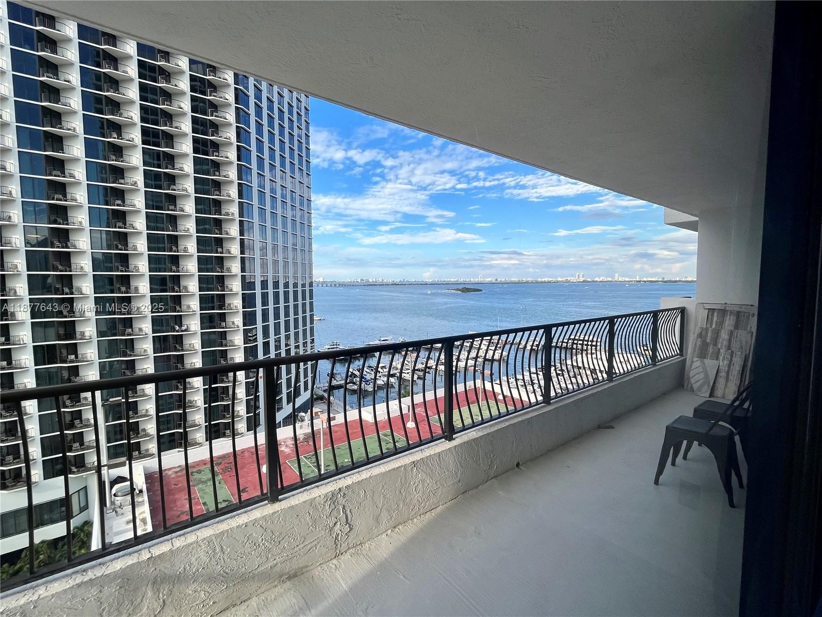 555 Northeast 15th Street, Unit 15G Miami, FL 33132 - Photo 20 of 61 a view of balcony with wooden floor