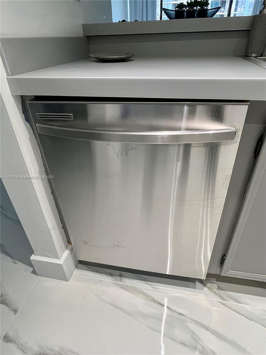 555 Northeast 15th Street, Unit 15G Miami, FL 33132 - Photo 40 of 61 a close view of washer and dryer