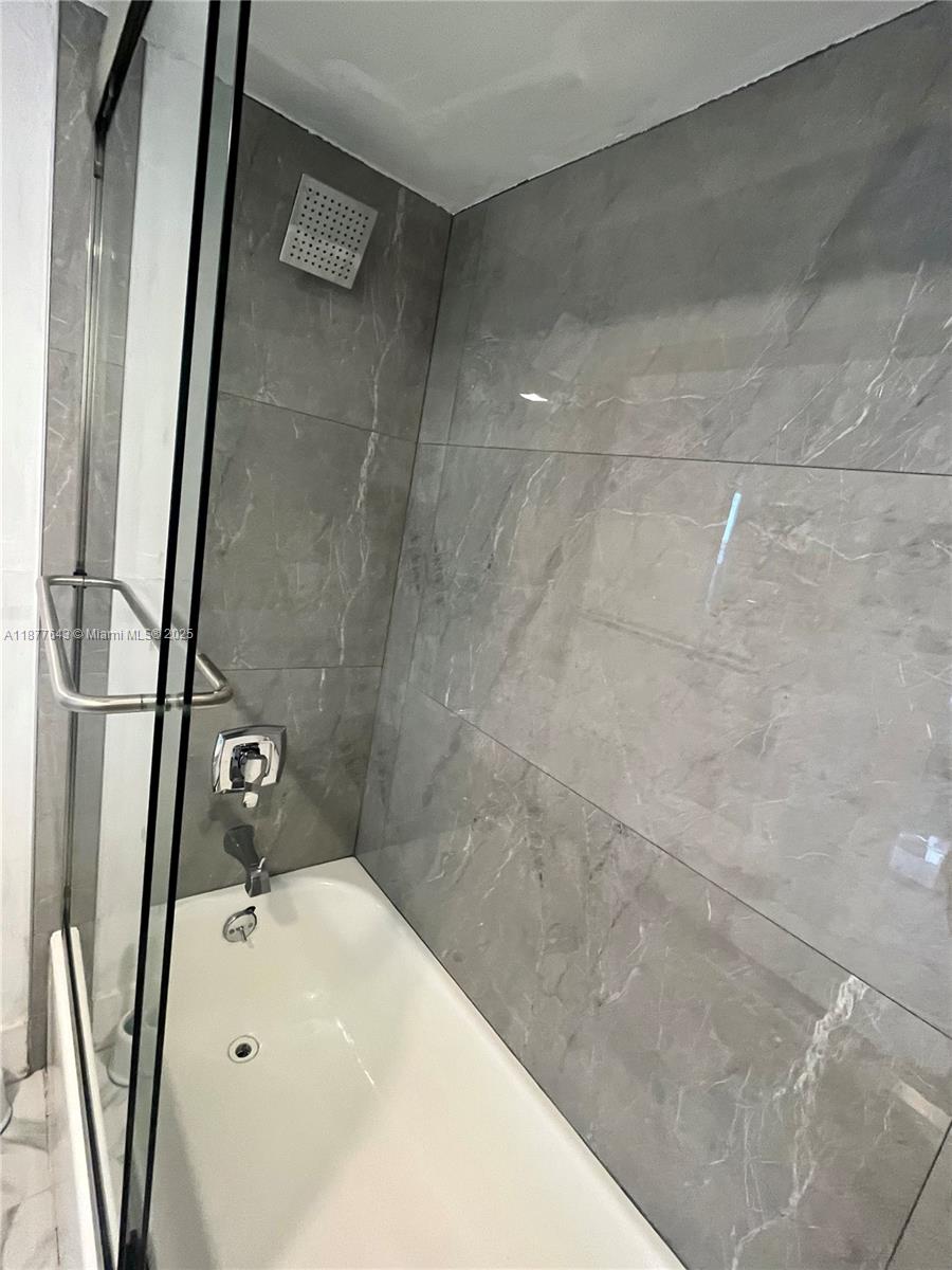 555 Northeast 15th Street, Unit 15G Miami, FL 33132 - Photo 50 of 61 a bathroom with a sink