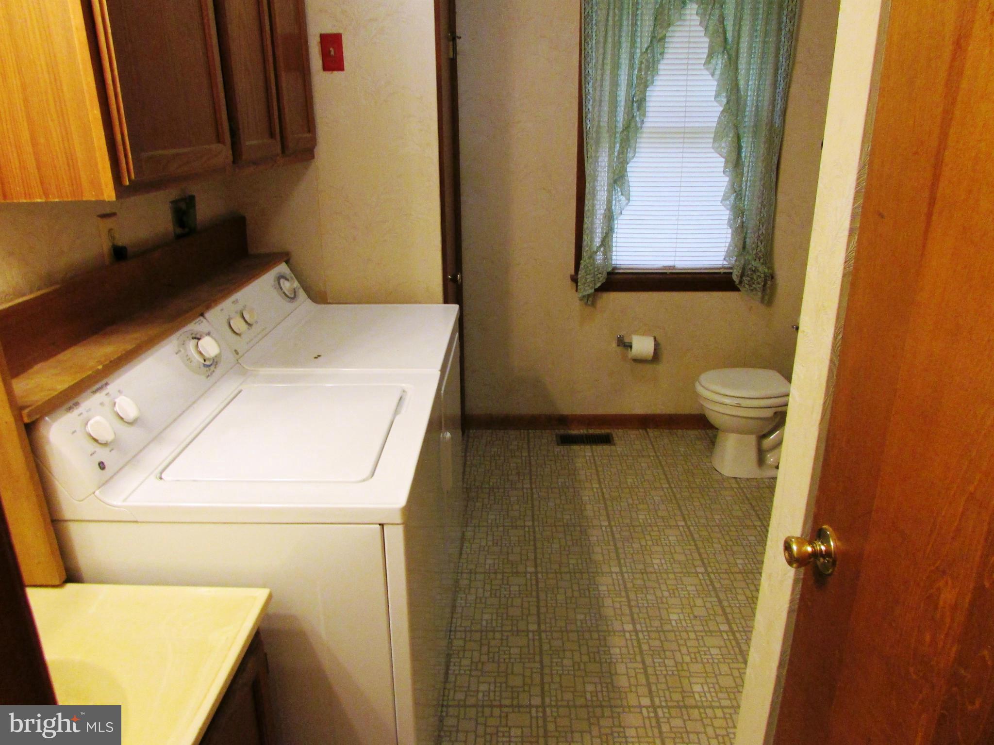 8774 Gunston Road Welcome, MD 20693 - Photo 24 of 29 Bath w/Shower and Laundry Area