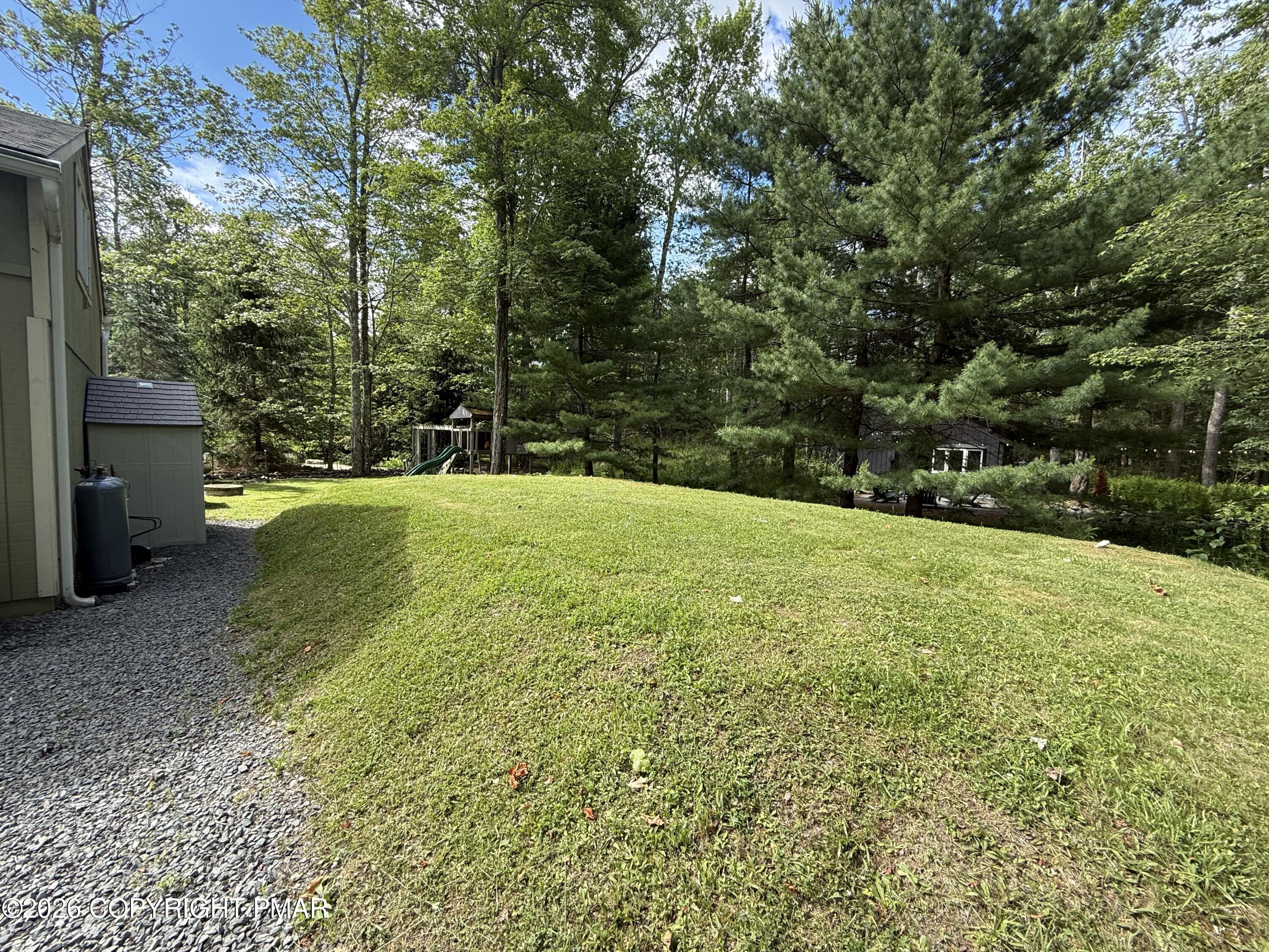 1165 Manor Hill Road Pocono Pines, PA 18350 - Photo 26 of 27 1165-Backyard1