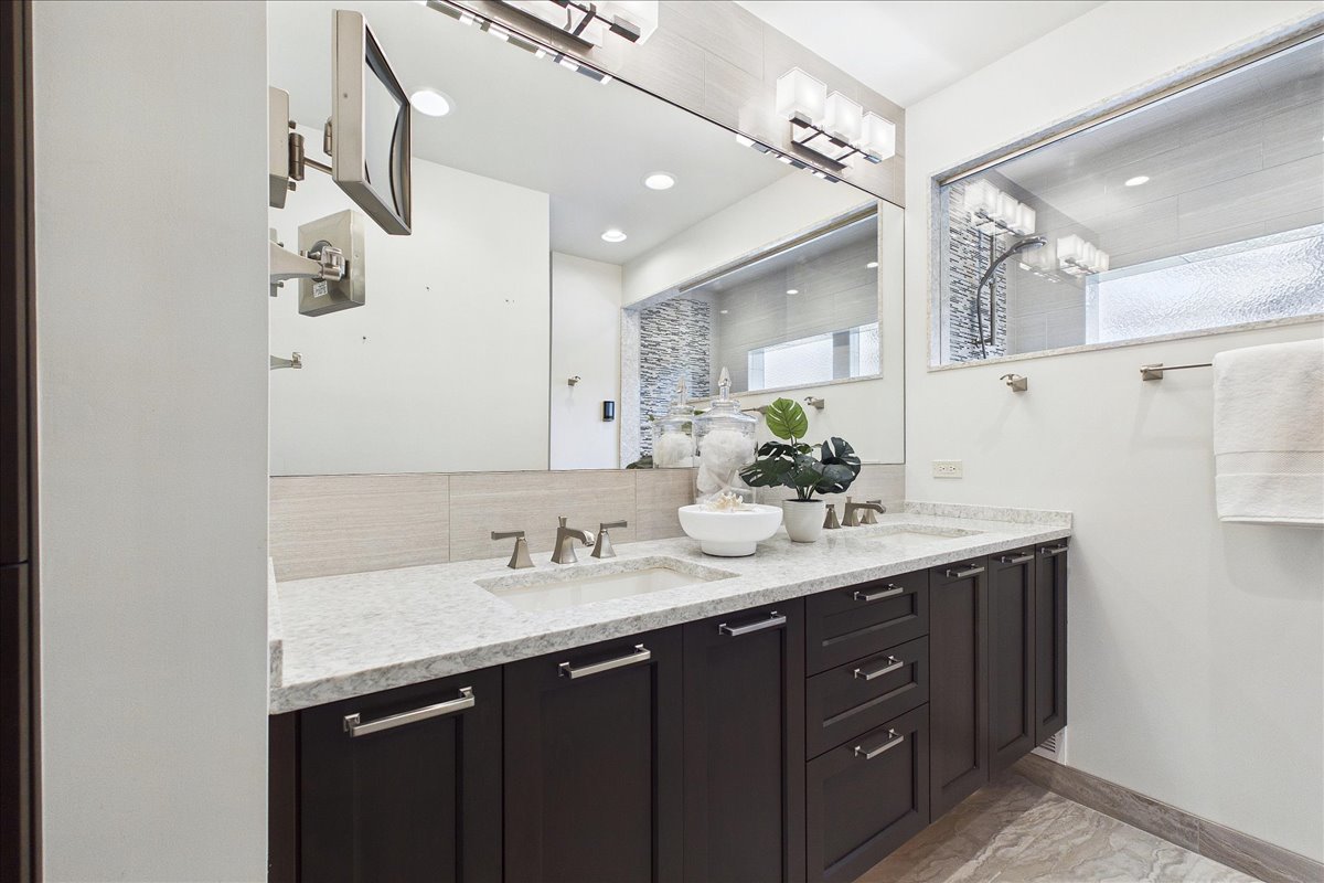 131 West Everett Road Lake Forest, IL 60045 - Photo 15 of 43 a bathroom with a sink double vanity and a mirror