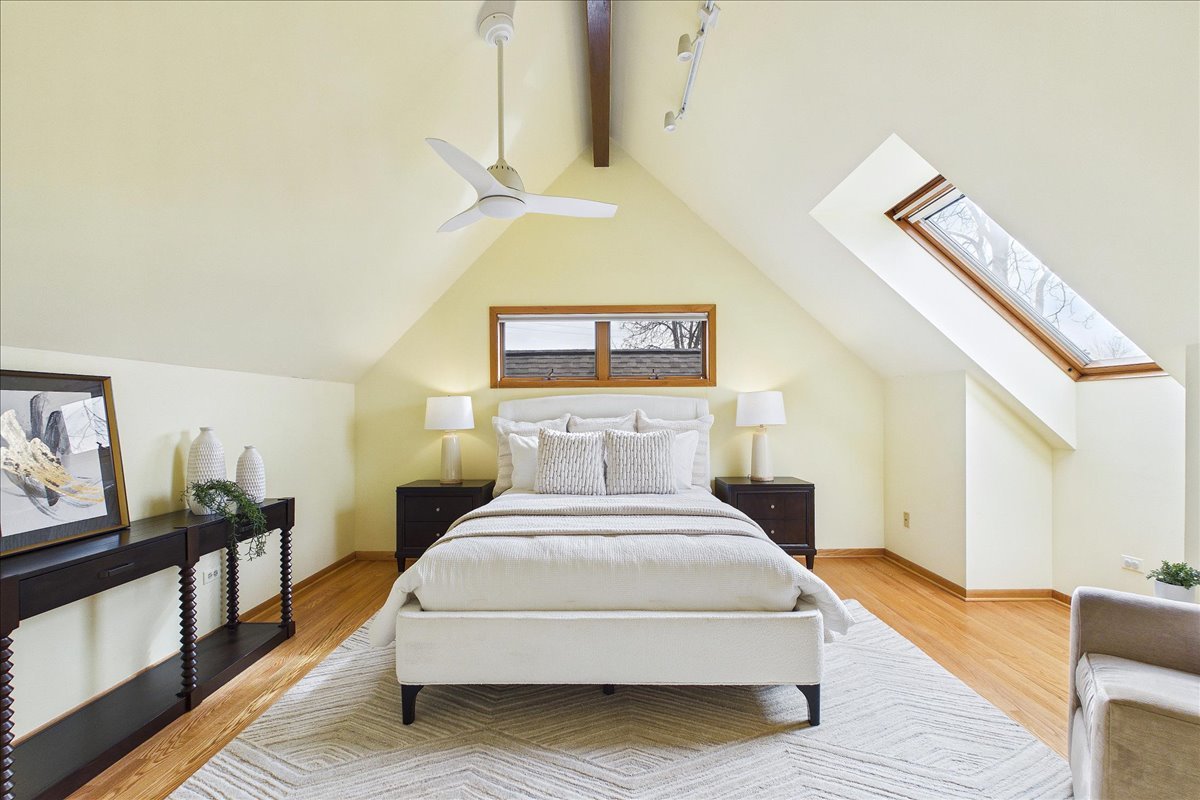 131 West Everett Road Lake Forest, IL 60045 - Photo 25 of 43 a spacious bedroom with a bed and wooden floor