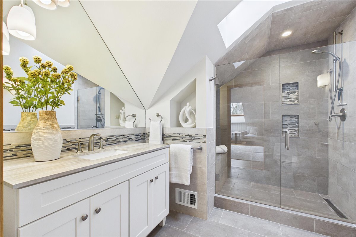 131 West Everett Road Lake Forest, IL 60045 - Photo 31 of 43 a bathroom with a granite countertop sink a mirror and a shower