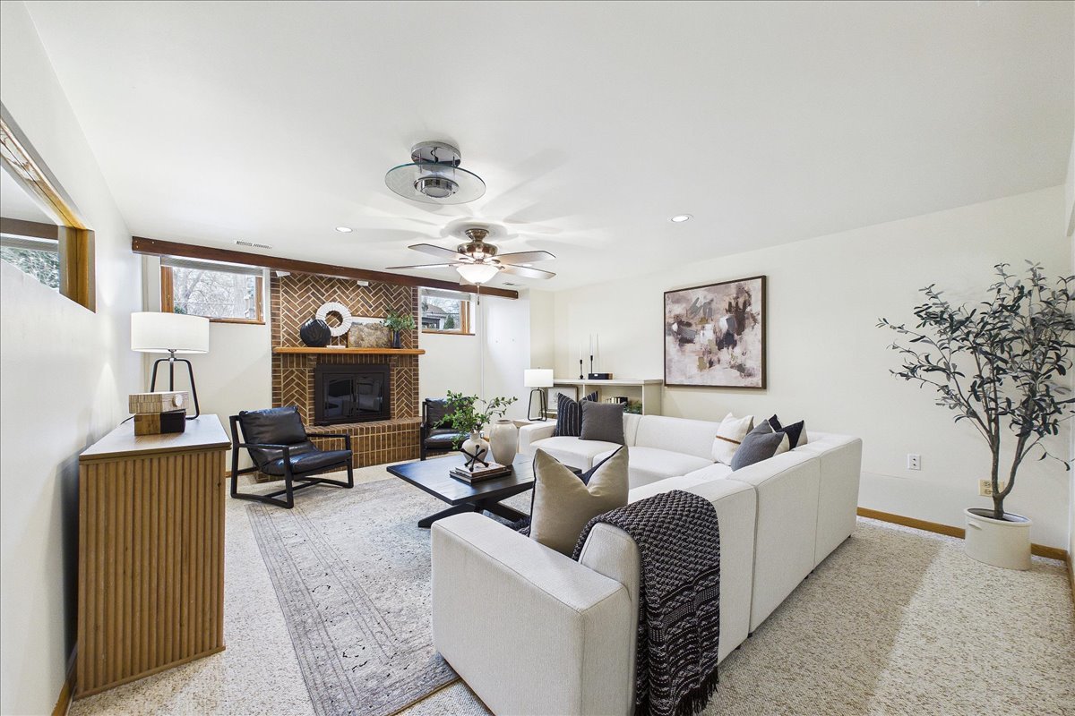 131 West Everett Road Lake Forest, IL 60045 - Photo 32 of 43 a living room with furniture a fireplace and a potted plant