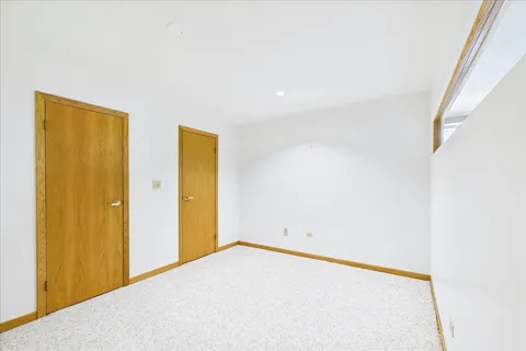 a view of a room with a hallway