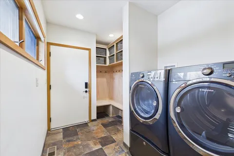 a utility room with dryer and washer