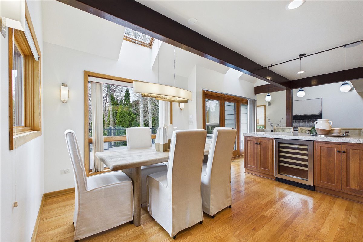 131 West Everett Road Lake Forest, IL 60045 - Photo 8 of 43 a view of a dining room with furniture window and wooden floor