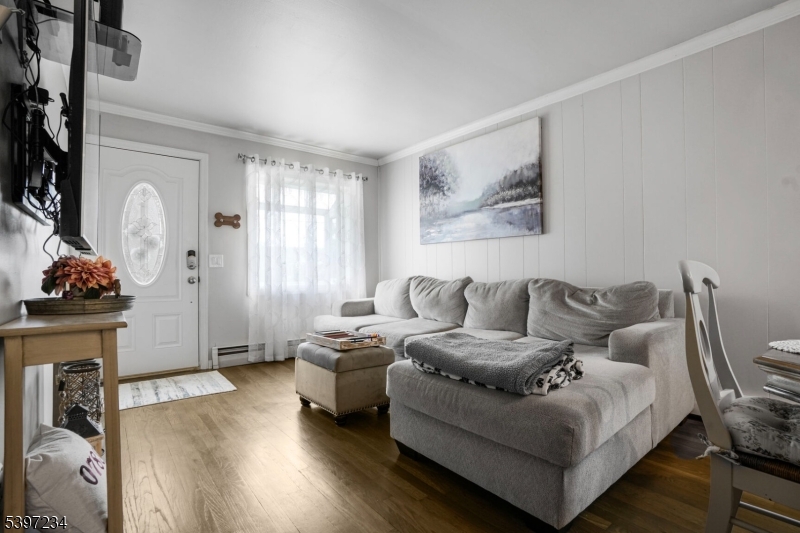 102 East Shore Road Denville, NJ 07834 - Photo 3 of 14 a living room with furniture and a fireplace