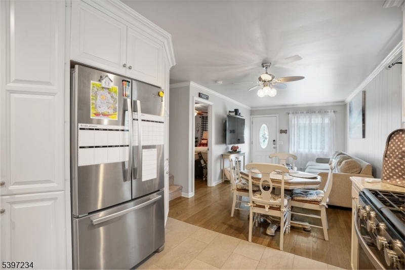 102 East Shore Road Denville, NJ 07834 - Photo 5 of 14 a view of a dining room with furniture window and wooden floor