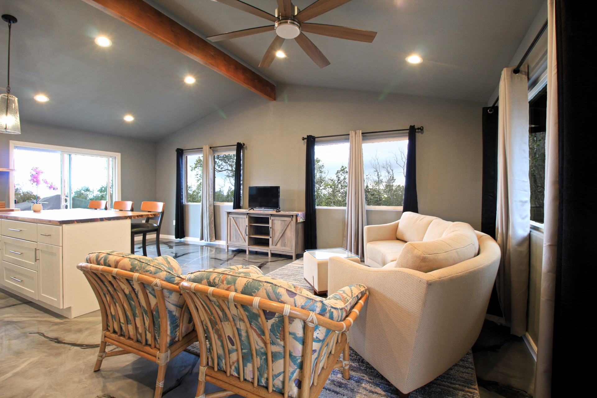 92-1920 Aloha Boulevard Ocean View, HI 96704 - Photo 13 of 26 a living room with furniture and a large window