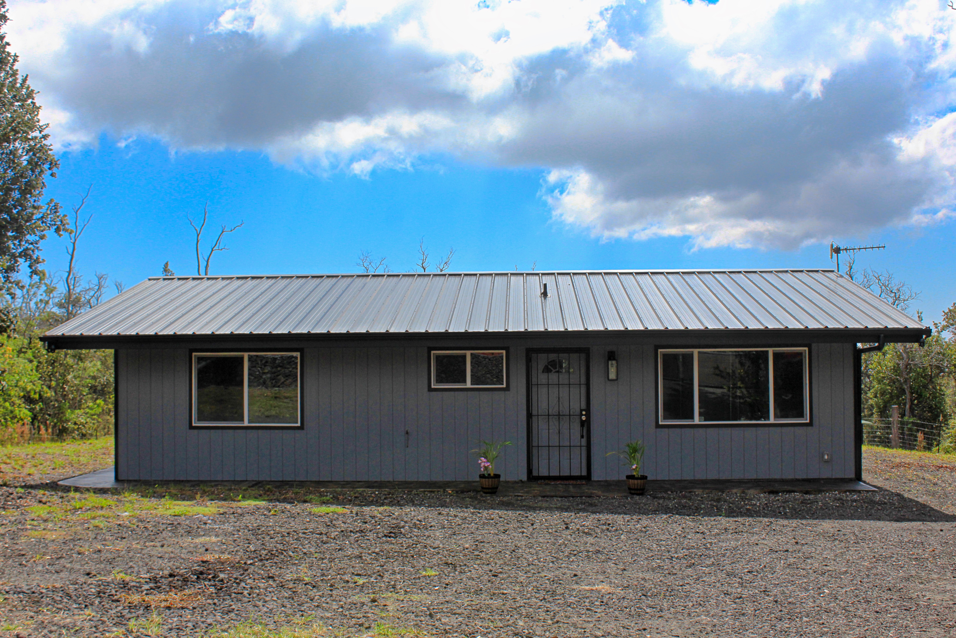 92-1920 Aloha Boulevard Ocean View, HI 96704 - Photo 3 of 26 a backyard of a house