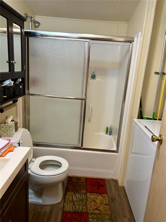 25646 Bass Road Astor, FL 32102 - Photo 19 of 48 a bathroom with a toilet and a shower