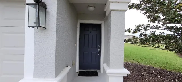 a bathroom with a toilet and shower