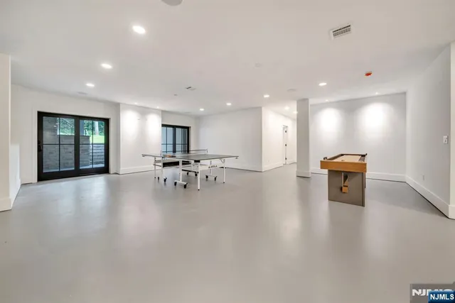a view of dining room with furniture and wooden floor