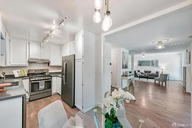 a view of a living room and dining room