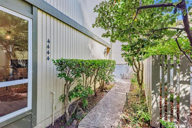 a backyard of a house with lots of green space