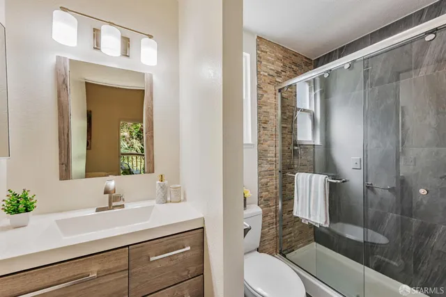 a view of a balcony with an outdoor space