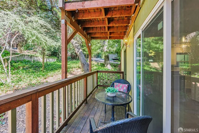 a view of a street with cars on road