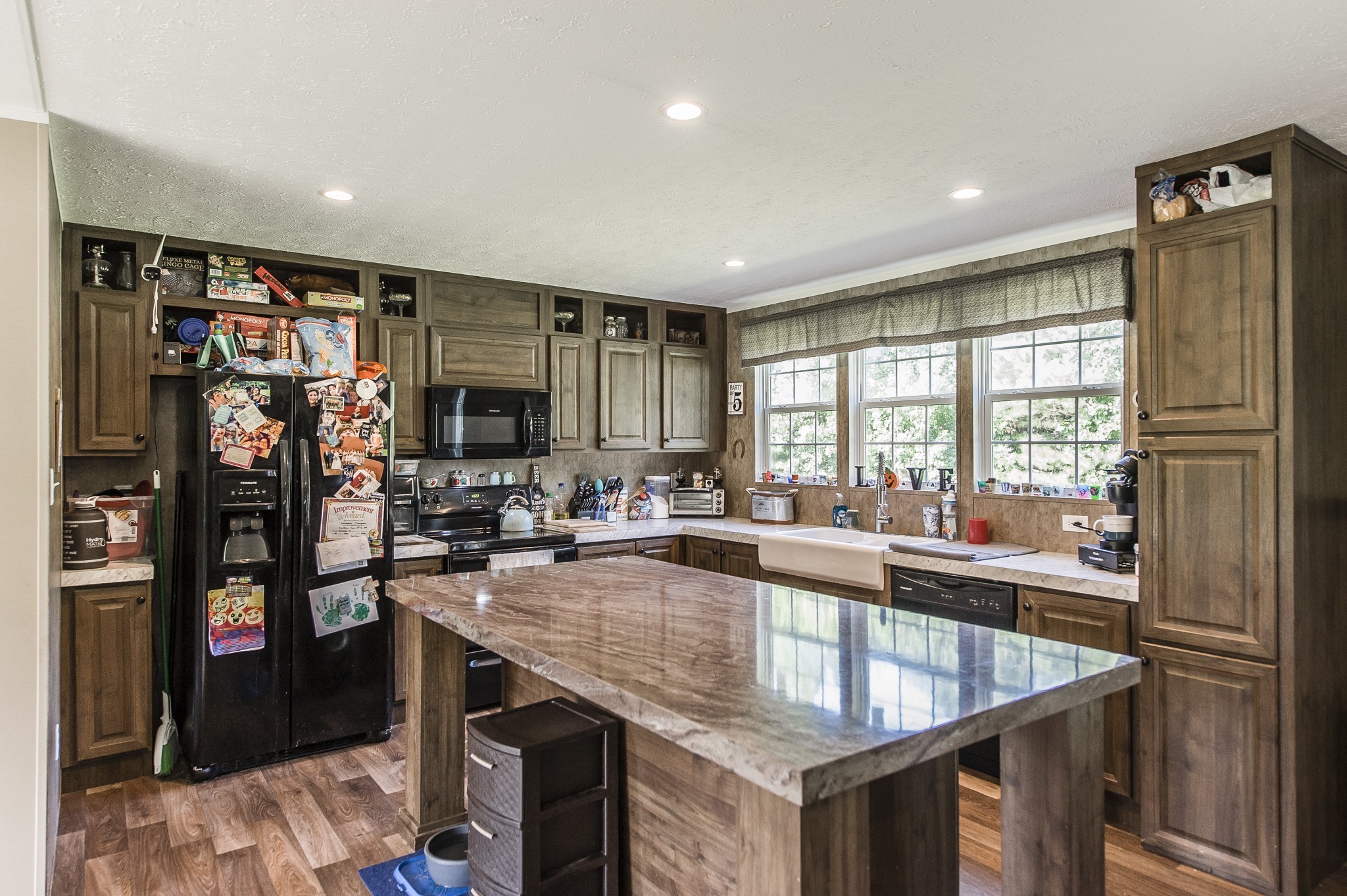 537 Bob Perry Road Bethpage, TN 37022 - Photo 15 of 63 a kitchen with counter top space and stainless steel appliances