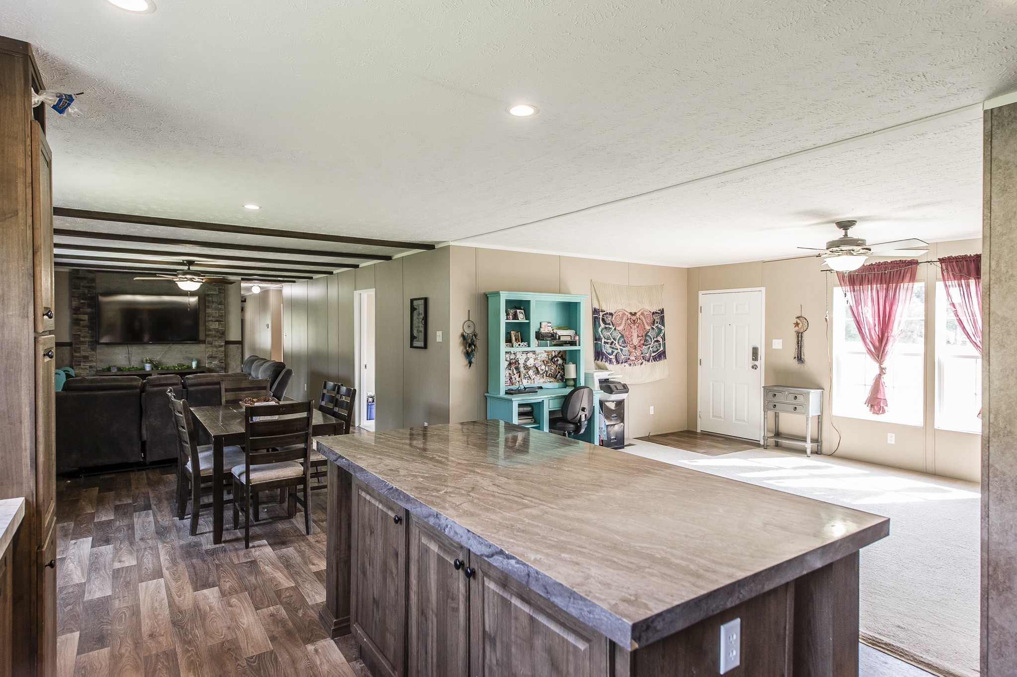 537 Bob Perry Road Bethpage, TN 37022 - Photo 17 of 63 a kitchen with granite countertop a stove dining table and chairs