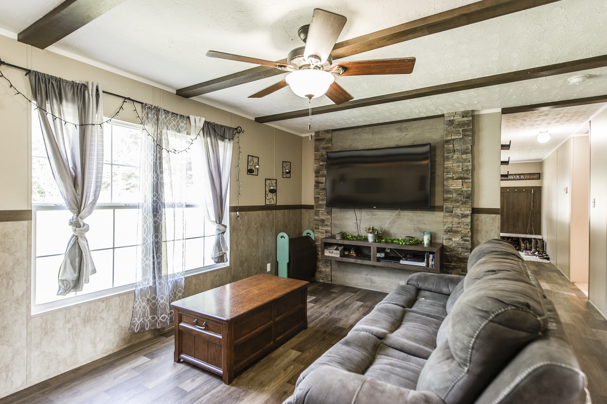 537 Bob Perry Road Bethpage, TN 37022 - Photo 25 of 63 a living room with furniture and a flat screen tv