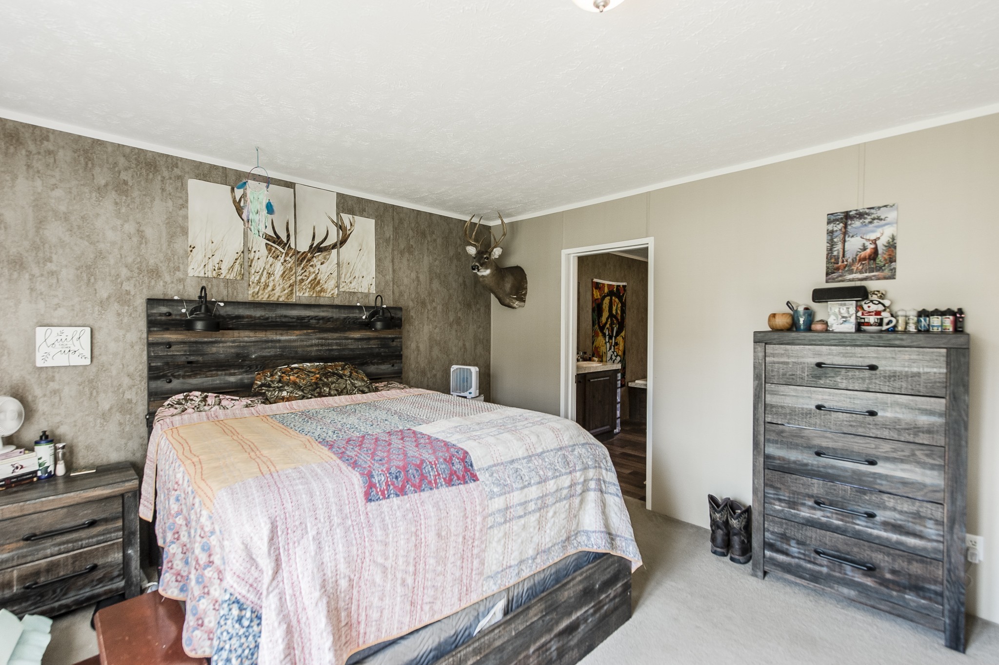 537 Bob Perry Road Bethpage, TN 37022 - Photo 30 of 63 a bedroom with a bed and a mirror