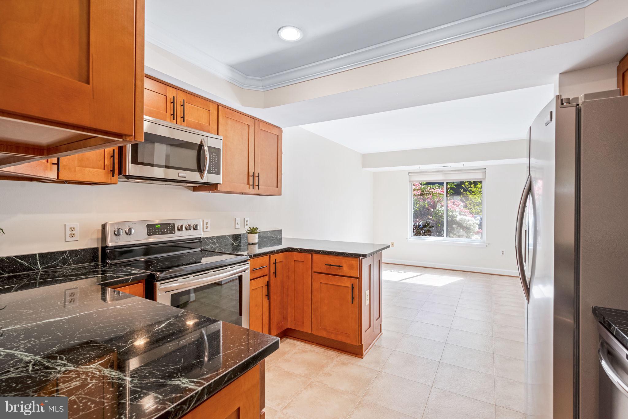 1705 Ivy Oak Square Reston, VA 20190 - Photo 7 of 36 Kitchen Opens to Breakfast Area or Family Room