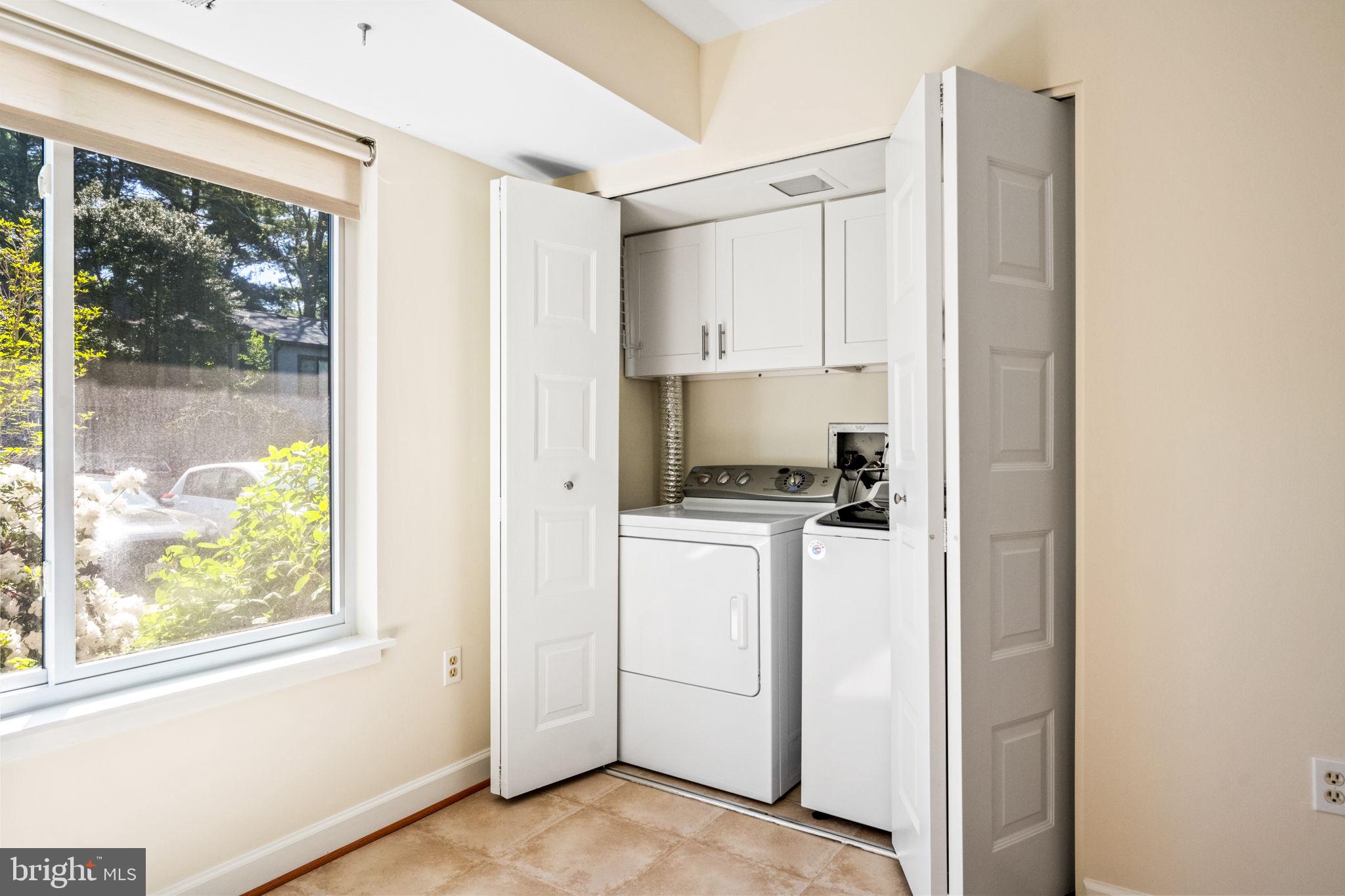 1705 Ivy Oak Square Reston, VA 20190 - Photo 10 of 36 1st Floor Laundry w/Cabinets