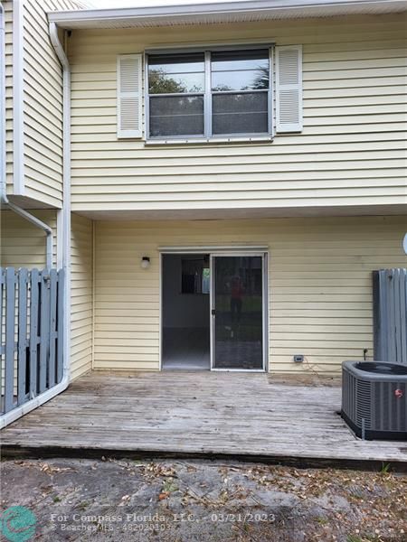 197 Southwest 3rd Street, Unit 197 Pompano Beach, FL 33060 - Photo 28 of 28 a view of a house with a window