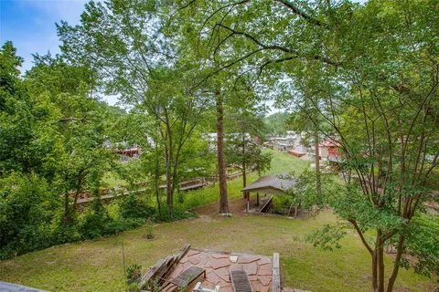 aerial view of a house with a yard
