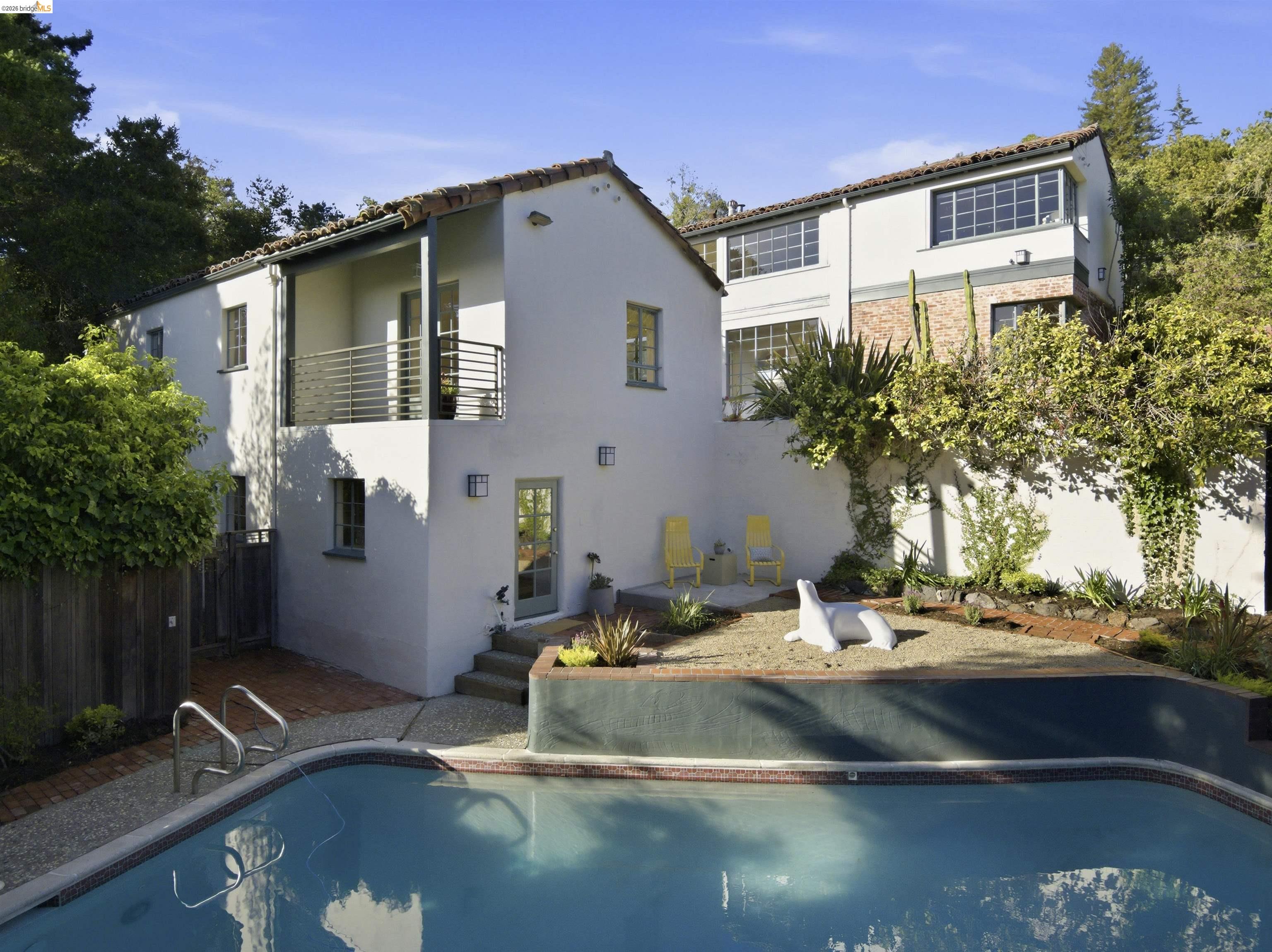 44 Highgate Road Kensington, CA 94707 - Photo 83 of 83 a view of a house with backyard and sitting area
