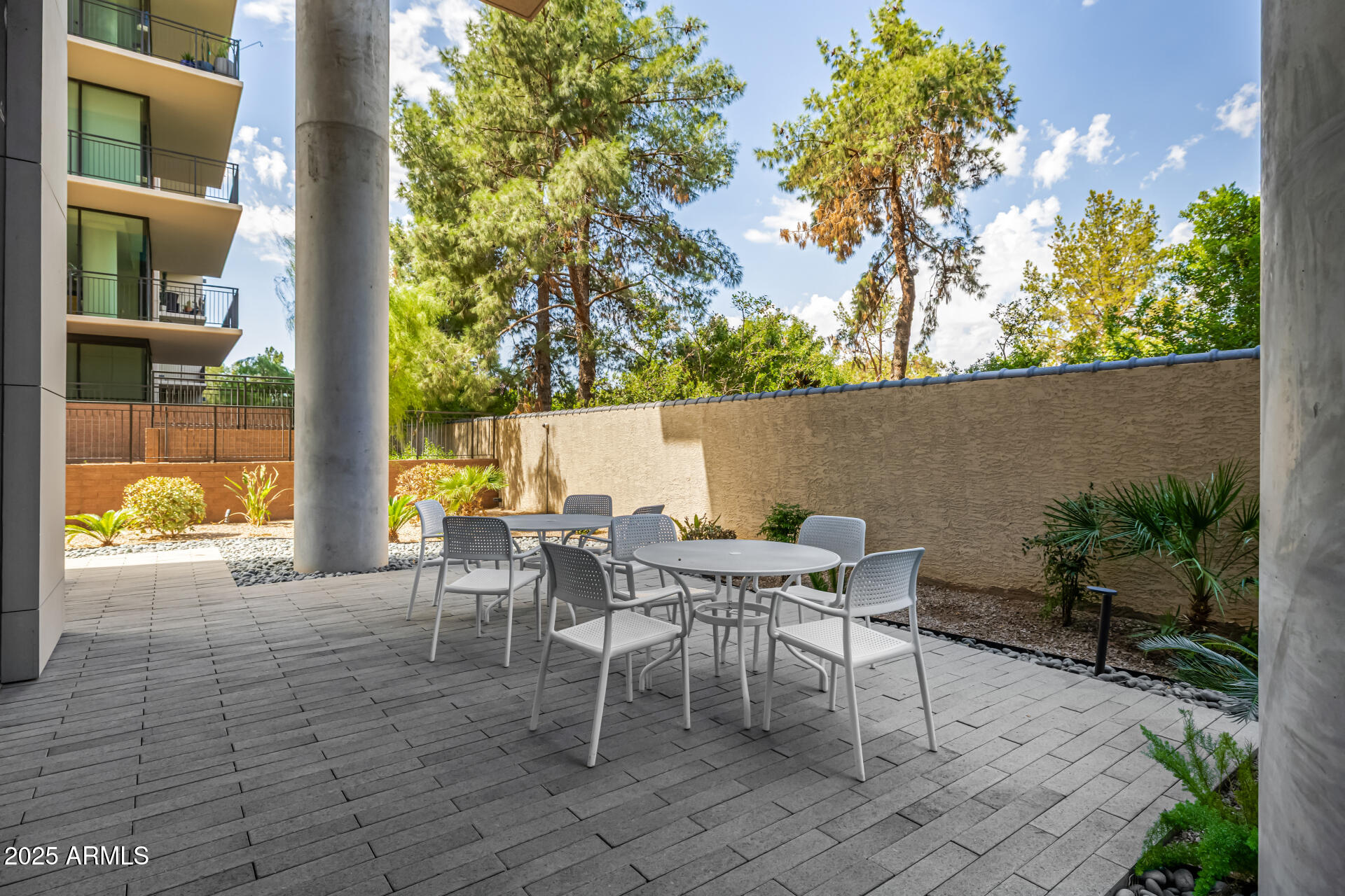200 West Portland Street, Unit 827 Phoenix, AZ 85003 - Photo 45 of 111 a view of a patio with table and chairs and potted plants