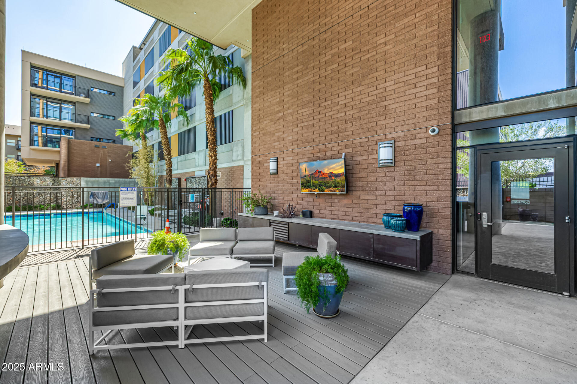 200 West Portland Street, Unit 827 Phoenix, AZ 85003 - Photo 50 of 111 a view of a patio with couches and potted plants